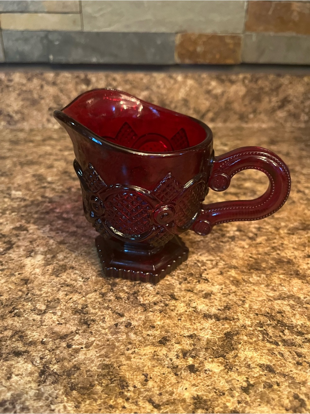 Avon Ruby Red Glass Creamer Pitcher with Embossed Pattern